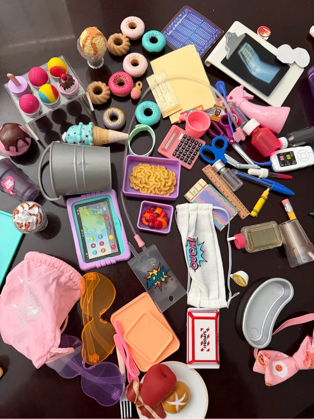Our generation sets: food, doctor office, school, and some other accessories